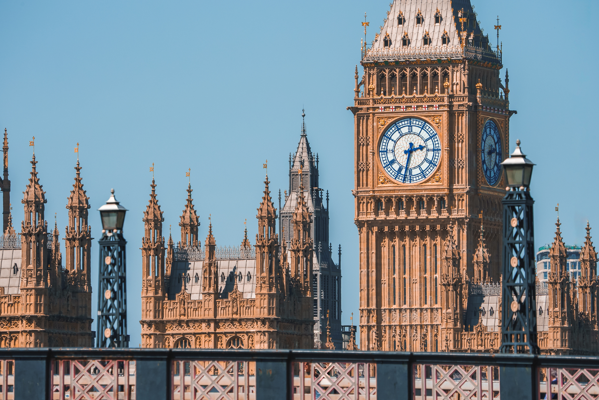 A classic red telephone box and Big Ben in London