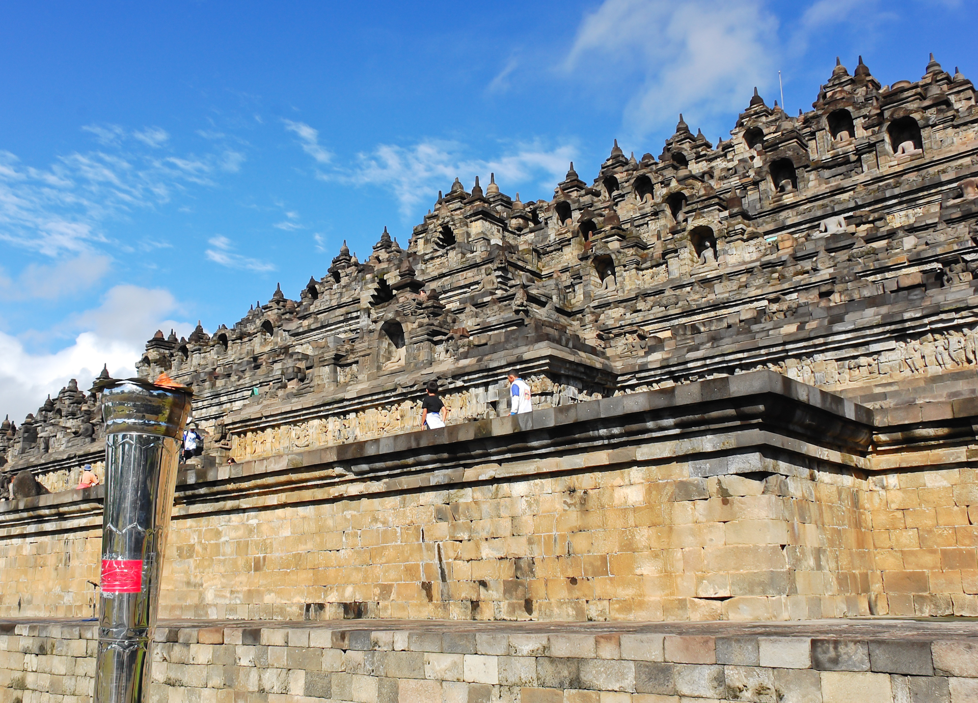 Stone stupas of Borobudur temple at sunrise