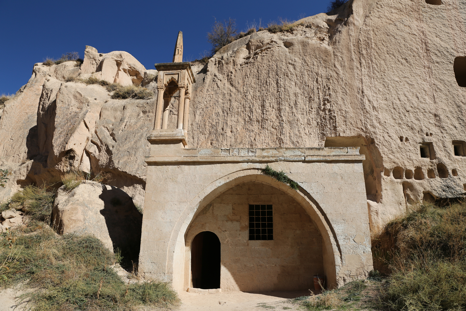 A mosque set among the rock formations of the Zelve Valley in Cappadocia